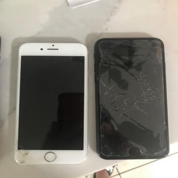 2 IPHONES with cracked fronts