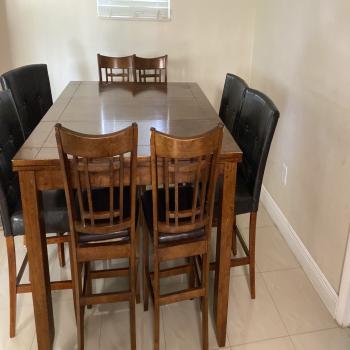 High top table with 8 chairs